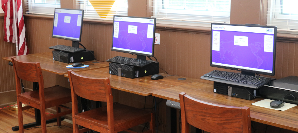 Photo of 3 desktop computers available for public use at Molino Library