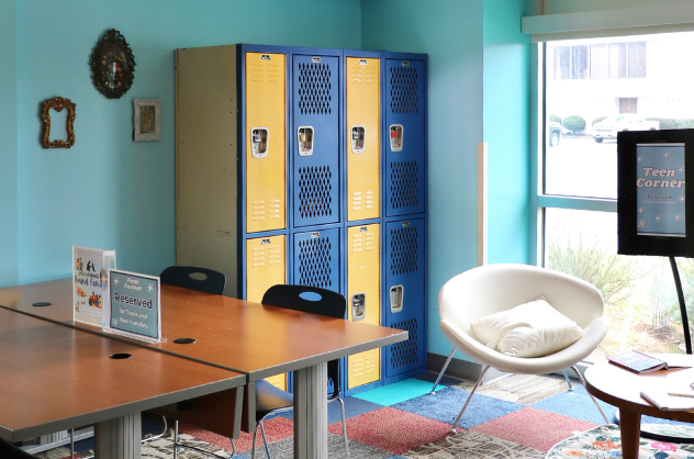 The teen corner at Pensacola Library features lockers, comfortable seating, and tables reserved for teens.